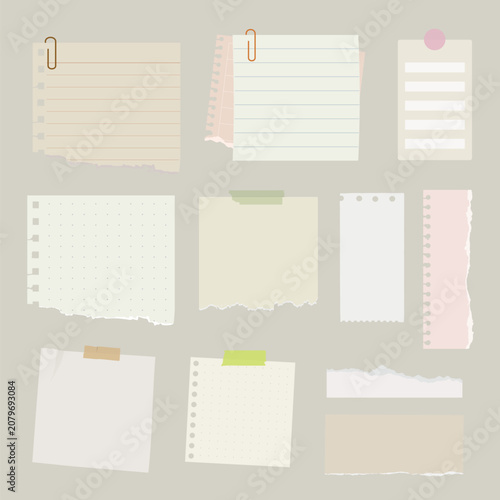 Photos Vector set of various torn paper notes with clips and tape on a neutral background