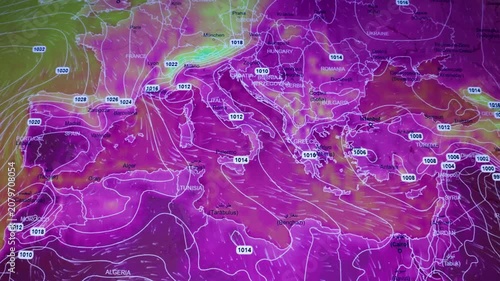 Heat wave over Europe colorful weather data screen showing pressure lines, wind flow and atmospheric systems Europe Mediterranean Balkans North Africa filmed from computer display visible pixels.