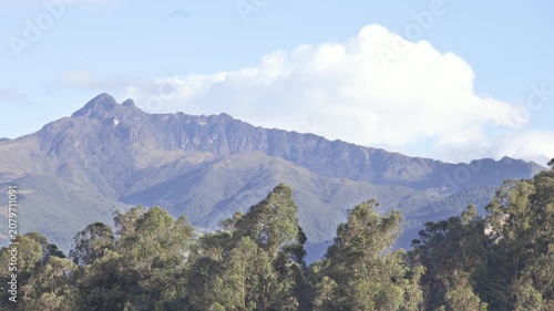 Quito, Ecuador - June 29, 2026: The Pasochoa volcano is an inactive volcano located in the Eastern Cordillera of the Andes, illuminated by the last rays of the sun of the day, in a beautiful sunset.