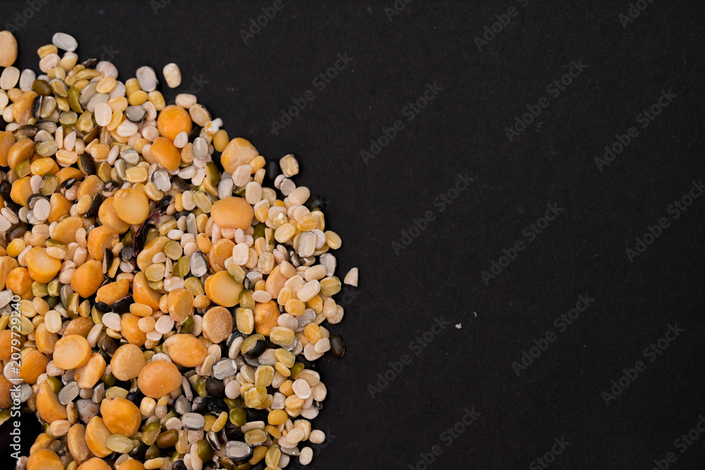 Fototapeta premium Panch Mishali Dal – Traditional Indian Mixed Lentil Curry in Bowl