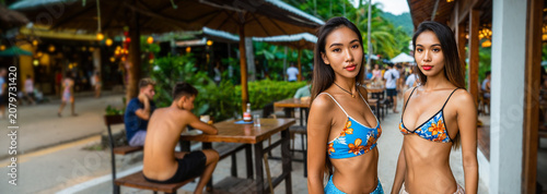 two young asian women in fl...