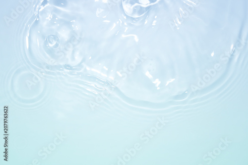 Soft Light Blue Water Texture with Ripples and Bubbles for Background