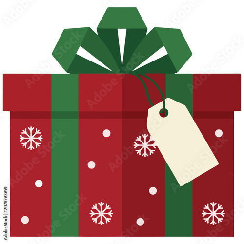 Red christmas gift box with green bow and blank tag christmas snowflake decoration celebration