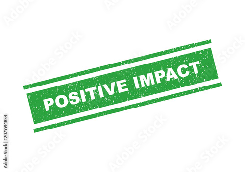 Green rubber stamp with the text positive impact