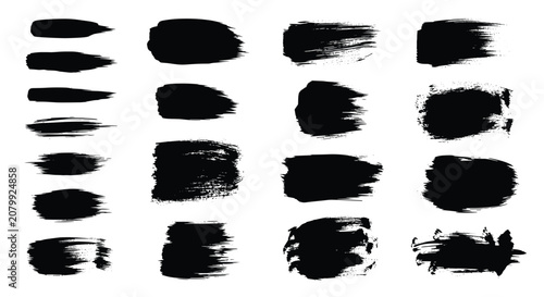 Selection of diverse black acrylic paint brush strokes and ink splatters arranged in grid on clean white background.