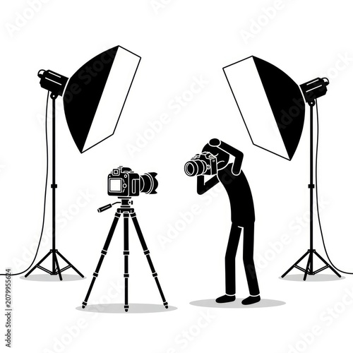 Photographer at work with studio lights.