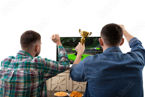 Two fans cheer while watching a football match on TV, PNG