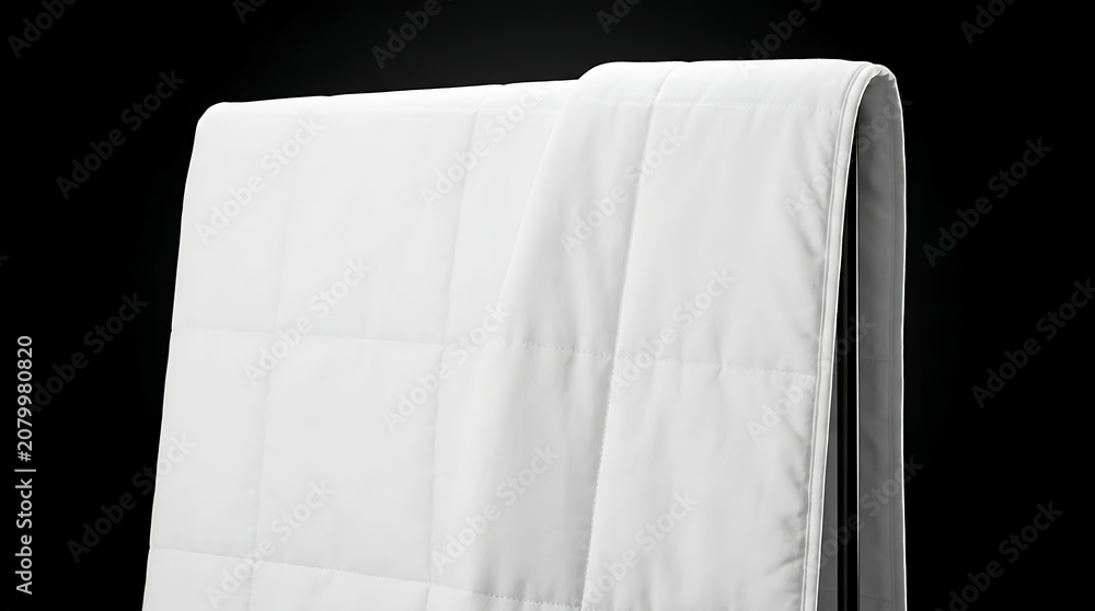 Fototapeta premium Clean white quilted bedding duvet folded over, soft textile texture, home interior comfort, bedroom linen decor element