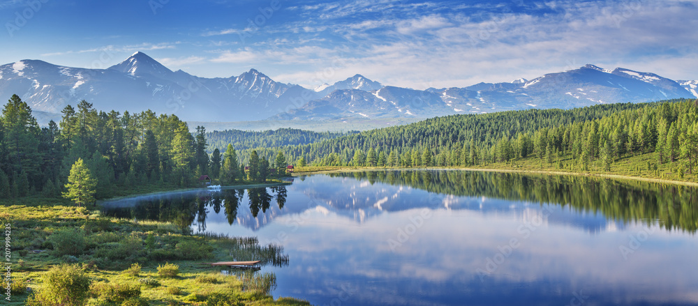 Fototapeta premium Mountain scenery, snow-capped mountain peaks, sunny morning, summer travels