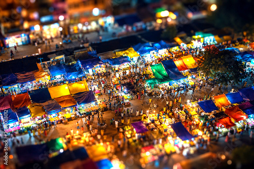Aerial Tilt-Shift View of Colourful South Indian Night Market with Vibrant Canopies and Crowds at Night