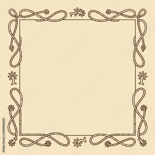 Vintage western rope frame with spurs on beige background
