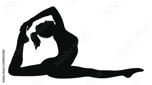 Obraz na płótnie Gymnast silhouette performs an advanced yoga pose involving a deep leg split and arched back