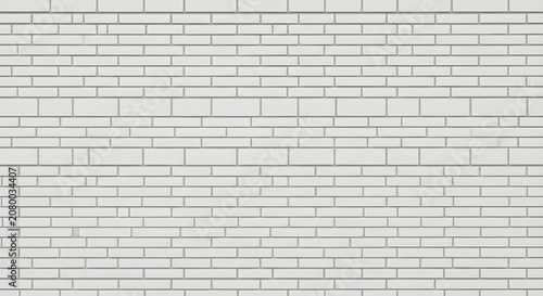 A close-up shot of a white brick wall with gray mortar lines