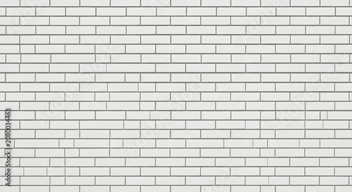 A close-up view of a worn brick wall with gray bricks and mortar
