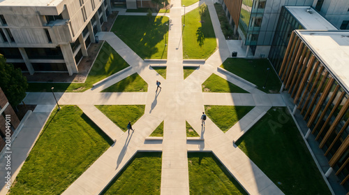 Aerial View of a Modern University Campus Courtyard at Sunset with Geometric Paths