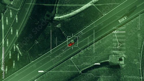 Foto Surveillance system tracks vehicle on highway in urban area