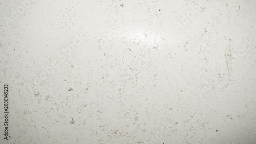 Fotografía White surface texture with subtle specks and light reflection.