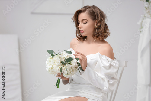 Beautiful bride with flower...