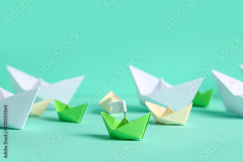 One origami boat with flag ...