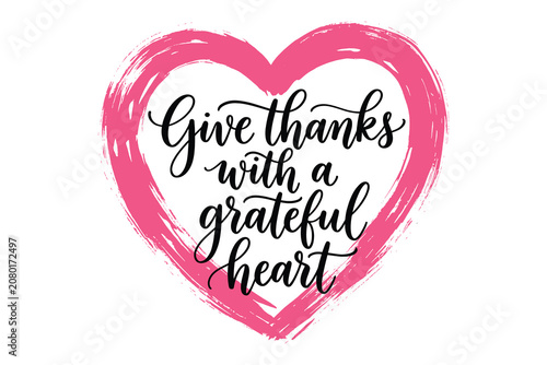 Inspirational gratitude message 'Give thanks with a grateful heart' in elegant handwritten typography on soft pink heart-shaped vector background