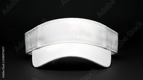 Isolated white sun visor with geometric pattern texture for summer sportswear and tennis accessories