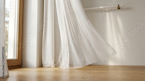 Light sheer white curtain blowing in gentle breeze near wooden window frame indoor home interior atmosphere airy soft