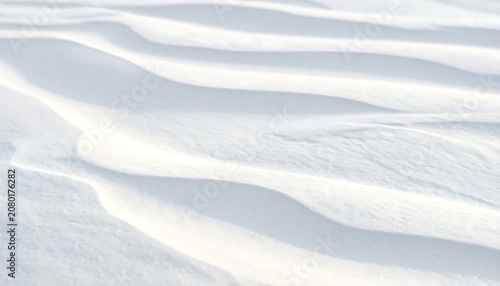 Abstract white textured background with soft waves.