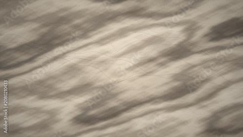 Bild auf Leinwand Shadows of folded fabric on beige background