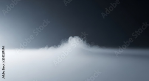 Mistary Cloudy Peak Emerging From Foggy Horizon