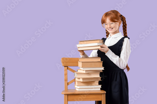 Cute redhead schoolgirl put...