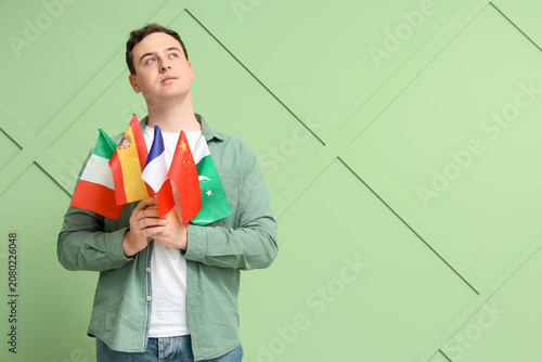 Young thoughtful man with d...