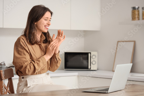 Young mute woman using sign...