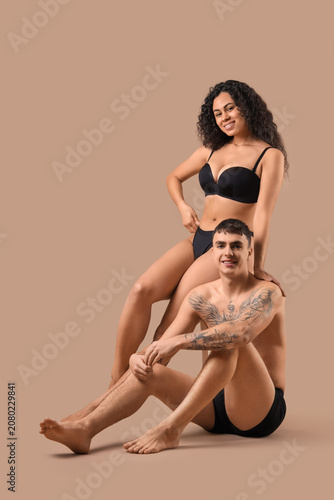 Young couple in stylish und...