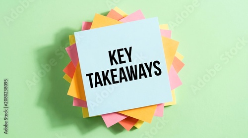 Brightly colored square sticky notes stacked neatly with bold text displaying important key takeaways message