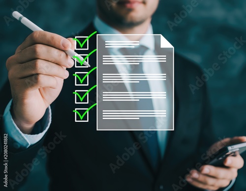 Businessman interacting with a digital checklist and task management interface