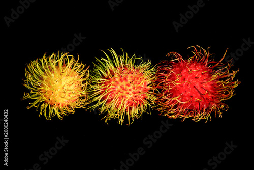 Tableau sur toile Rambutans organic fruit with hairy alien looking fruit, with a creamy taste and
