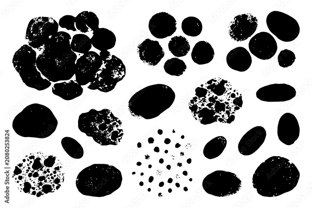 Fototapeta premium Abstract black grunge textured blots on white background.