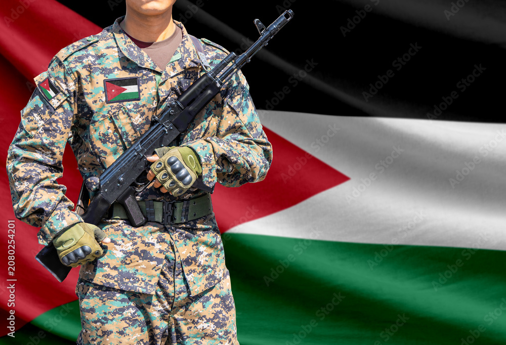 Fototapeta premium Jordan flag with soldier holding assault rifle