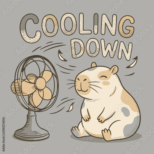 Tableau sur toile Cavy sitting next to fan.