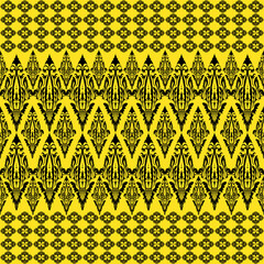 Intricate black baroque floral border seamless pattern on yellow background.
