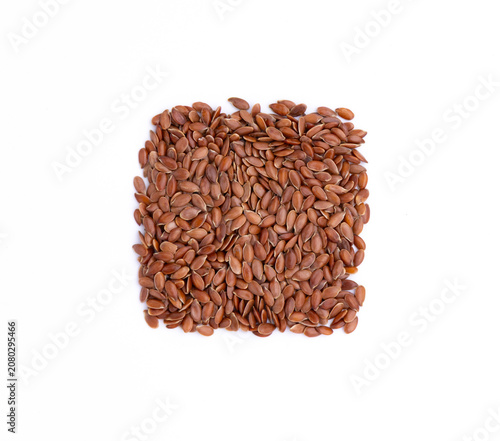 pile of flax seeds isolated on white