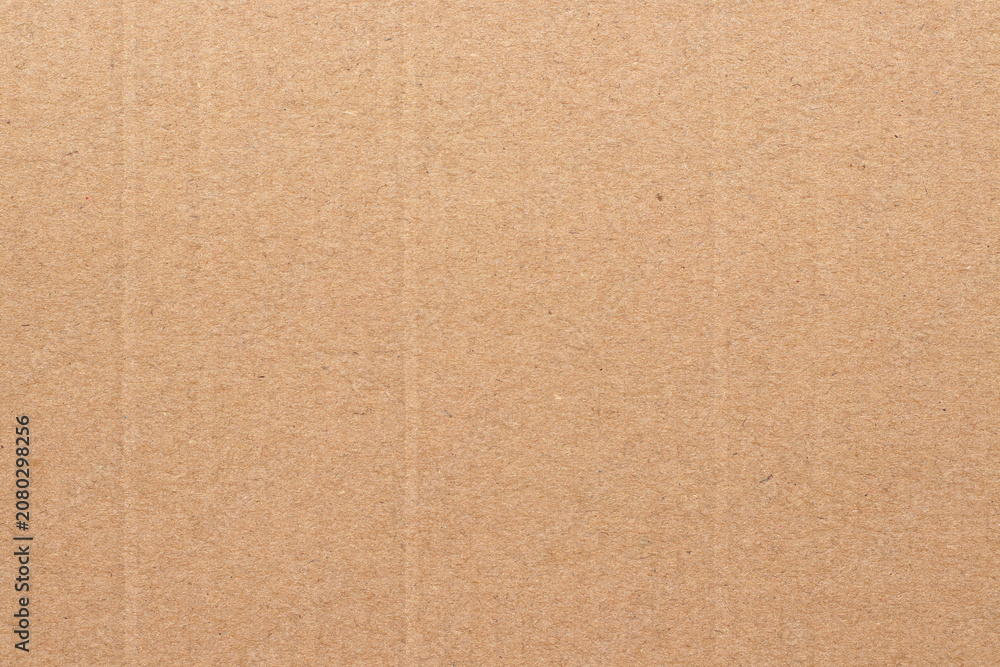 Fototapeta premium Brown cardboard sheet abstract background, texture of recycle paper box in old vintage pattern for design art work.