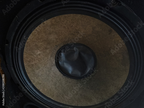 Obraz na plátně Close up of a dusty vintage subwoofer speaker cone with dented dust cap