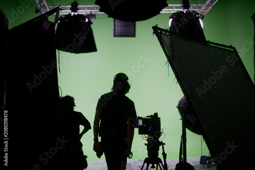 Film set, monitors and modern shooting equipment. Film crew, lighting devices, monitors, playbacks - filming equipment and a team of specialists in filming movies, advertising and TV series