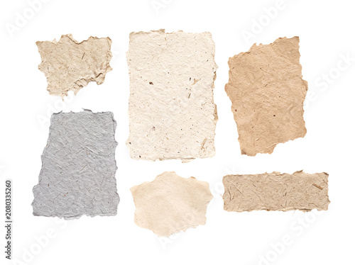 Photos Collection of six distinct torn paper pieces with various textures and natural colors, on transparent background