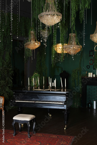 Green Velvet Nocturne: The captivating elegance of a black piano under crystal chandeliers. Vintage interior.