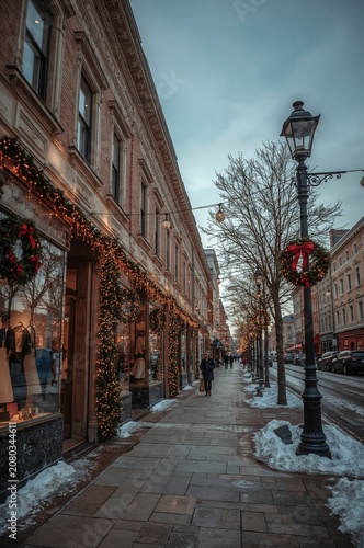 Shopping Street Decorated for Winter Holiday Season With Lights in City Center