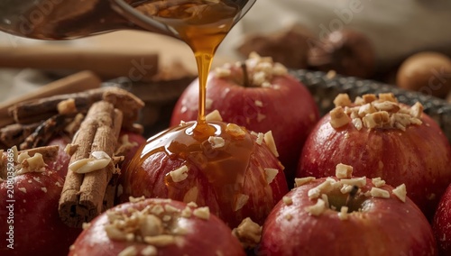 Delicious Apples Topped With Nuts and Caramel in Kitchen Setting
