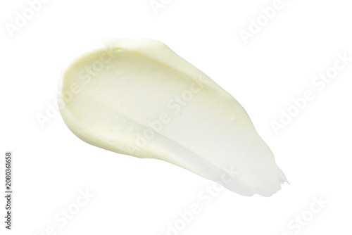 Creamy cosmetic smear of vitamin C face cream, serum or body cream butter isolated on transparent background. Skincare texture and moisturizing beauty product sample for design.