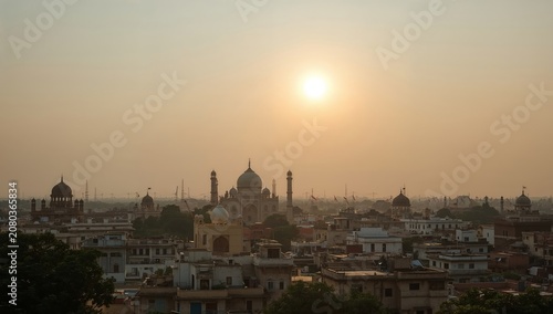 Sunrise Over the City With the Landmark Structure in the Distance and Buildin...
